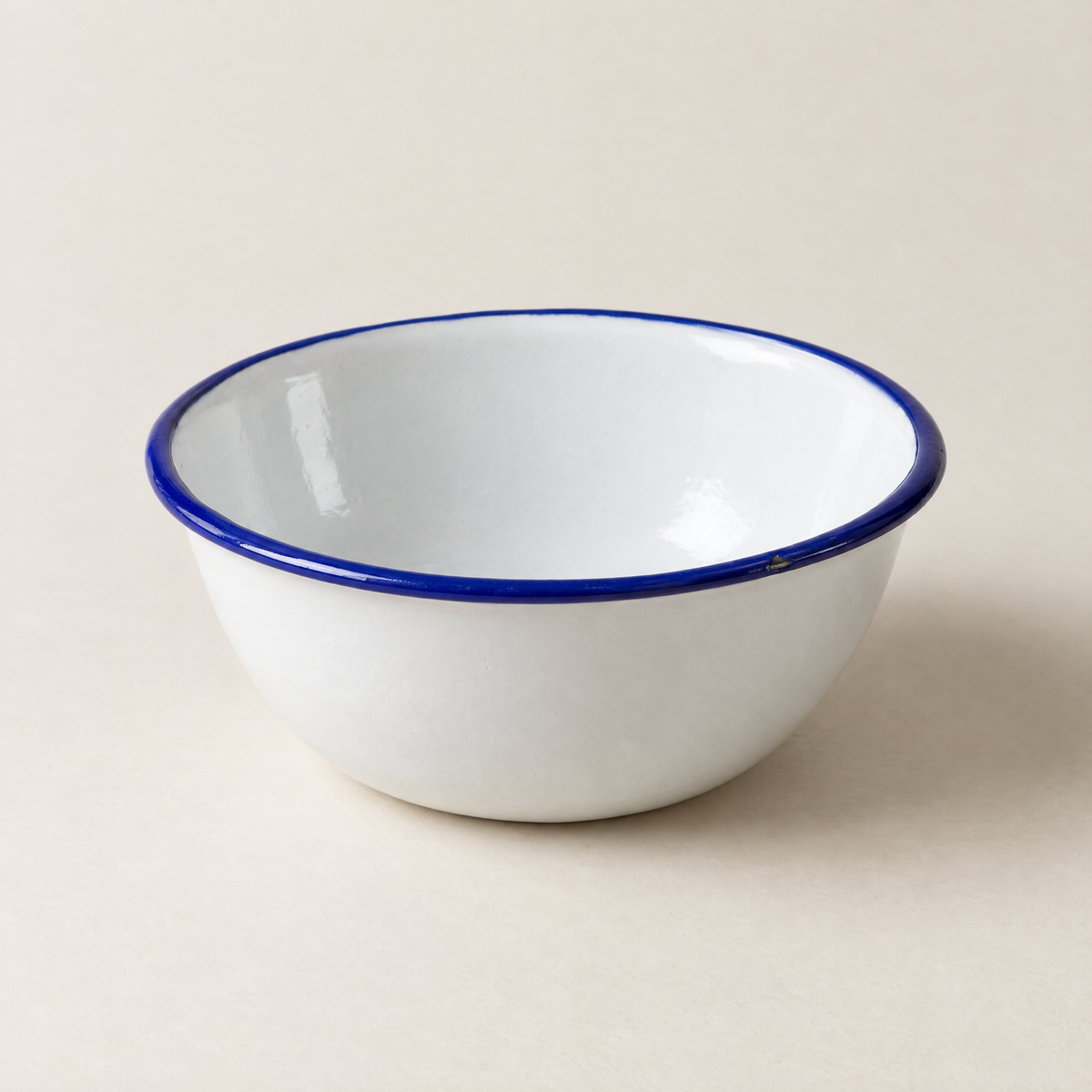 Aldorven 14 cm enamelled steel cereal bowl, white with a cobalt rim