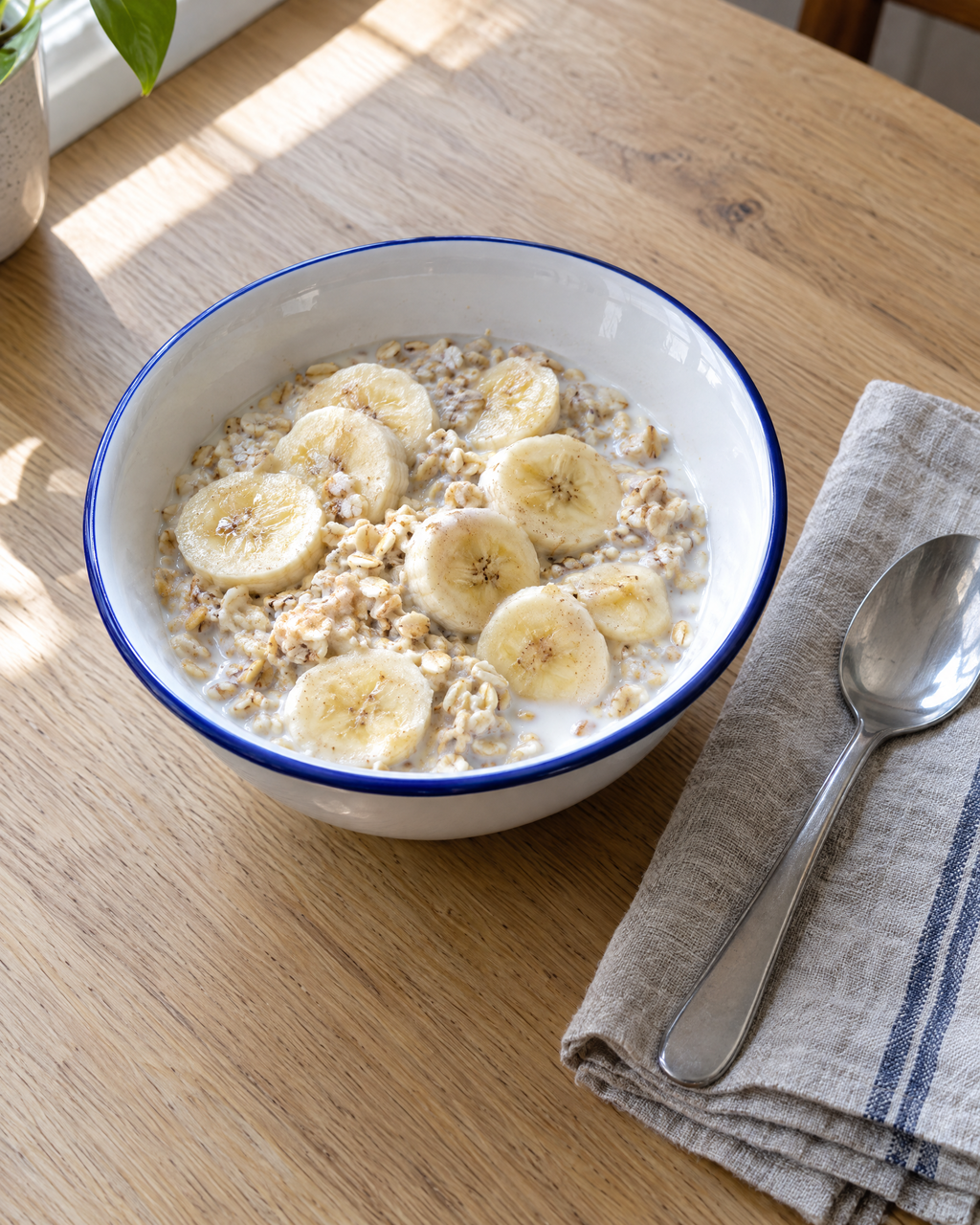Aldorven 14 cm enamelled steel cereal bowl, white with a cobalt rim