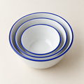 Aldorven nesting set of three enamelled steel bowls, white with cobalt rims